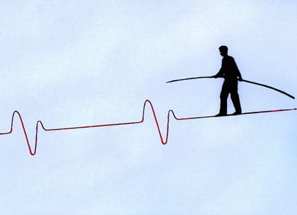 Graphic of doctor walking on cardiogram tightrope